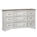 Magnolia Manor Leg 9 Drawer Dresser in Antique White - homePLUS (Binghamton, NY)
