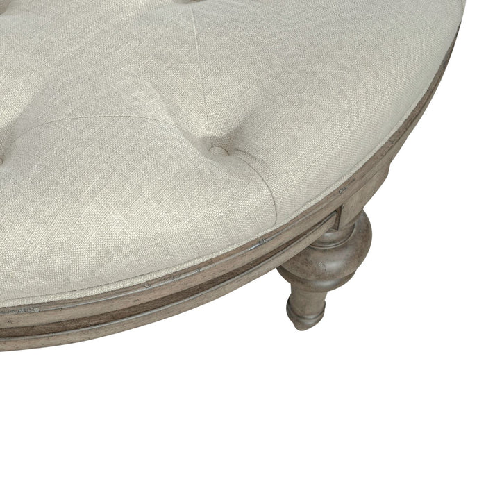 Americana Farmhouse Round Cocktail Ottoman in Dusty Taupe - homePLUS (Binghamton, NY)